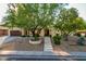 Spacious home exterior with mature trees and landscaping at 9020 N 33Rd Way, Phoenix, AZ 85028