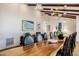 Elegant dining room featuring a long live-edge table and stylish chairs at 9020 N 33Rd Way, Phoenix, AZ 85028