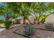 Beautiful home exterior surrounded by lush landscaping at 9020 N 33Rd Way, Phoenix, AZ 85028