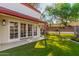 Backyard view of patio, grass, playset and pool at 9020 N 33Rd Way, Phoenix, AZ 85028