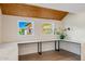Modern home office with marble desk and wood flooring at 9020 N 33Rd Way, Phoenix, AZ 85028