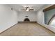 Living room with a fireplace and tile floors at 11801 S 193Rd Dr, Buckeye, AZ 85326