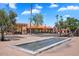 Community area with a central fountain and shops at 16844 E Ave Of The Fountains -- # 102, Fountain Hills, AZ 85268