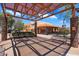 Relaxing plaza with shaded seating and nearby shops at 16844 E Ave Of The Fountains -- # 102, Fountain Hills, AZ 85268