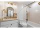 Clean bathroom with a bathtub, white vanity, and updated gold fixtures at 16844 E Ave Of The Fountains -- # 102, Fountain Hills, AZ 85268