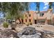 Peaceful courtyard with seating and desert landscaping at 16844 E Ave Of The Fountains -- # 102, Fountain Hills, AZ 85268