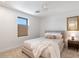 Bright bedroom featuring a plush bed and neutral color palette at 16844 E Ave Of The Fountains -- # 102, Fountain Hills, AZ 85268