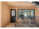 Private patio with seating area and direct access to unit at 16844 E Ave Of The Fountains -- # 102, Fountain Hills, AZ 85268