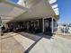 Covered patio with seating area and golf cart at 650 N Hawes Rd # 3809, Mesa, AZ 85207