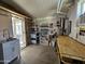 Bright workshop with sink, cabinetry, and exterior access at 650 N Hawes Rd # 3809, Mesa, AZ 85207