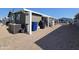 Gravel backyard with storage bins and grill at 650 N Hawes Rd # 3809, Mesa, AZ 85207
