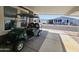Covered patio with golf cart and view of neighborhood at 650 N Hawes Rd # 3809, Mesa, AZ 85207