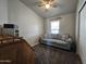 Bedroom with a sofa and plenty of natural light at 650 N Hawes Rd # 3809, Mesa, AZ 85207