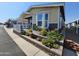 House exterior featuring landscaping and a bay window at 650 N Hawes Rd # 3809, Mesa, AZ 85207