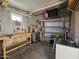 Organized workshop featuring metal shelving and a utility sink at 650 N Hawes Rd # 3809, Mesa, AZ 85207