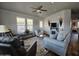 Relaxing living room featuring a fireplace and ample seating at 650 N Hawes Rd # 3809, Mesa, AZ 85207