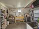 Well-equipped workshop with workbench, storage, and tools at 650 N Hawes Rd # 3809, Mesa, AZ 85207