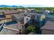 Aerial view of a three-story townhome among other homes at 1632 N 77Th Gln, Phoenix, AZ 85035