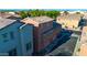 Aerial view of a townhome with a two-car garage and surrounding homes at 1632 N 77Th Gln, Phoenix, AZ 85035