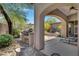 Outdoor kitchen and lounge area with built-in grill at 8874 E Flathorn Dr, Scottsdale, AZ 85255