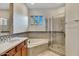 Elegant bathroom with soaking tub, shower, and double vanity at 8874 E Flathorn Dr, Scottsdale, AZ 85255