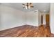 Bright bedroom with hardwood floors and ceiling fan at 8874 E Flathorn Dr, Scottsdale, AZ 85255