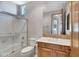 Clean bathroom with a shower/tub combo, toilet, and wood vanity at 8874 E Flathorn Dr, Scottsdale, AZ 85255