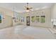 Open concept living room with a fireplace, high ceilings and lots of natural light at 8874 E Flathorn Dr, Scottsdale, AZ 85255