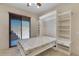 Guest bedroom with Murphy bed and backyard access at 8874 E Flathorn Dr, Scottsdale, AZ 85255