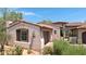 Spanish style home with a two-car garage at 8874 E Flathorn Dr, Scottsdale, AZ 85255