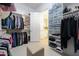 Custom-designed walk-in closet with shelves, drawers, and hanging space at 19232 N Cathedral Point Ct, Surprise, AZ 85387