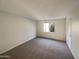 Spacious bedroom with neutral walls and carpet at 10828 N Biltmore Dr # 203, Phoenix, AZ 85029