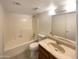 Clean bathroom featuring a bathtub, toilet and vanity at 10828 N Biltmore Dr # 203, Phoenix, AZ 85029