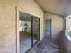 Private balcony with sliding glass doors and an exterior door at 10828 N Biltmore Dr # 203, Phoenix, AZ 85029