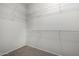 Walk-in closet with wire shelving at 15631 W Bethesda Ct, Surprise, AZ 85374