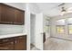 Bright kitchen with a pantry and plenty of cabinet storage at 15631 W Bethesda Ct, Surprise, AZ 85374