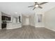 Spacious living room, open to kitchen and entry at 15631 W Bethesda Ct, Surprise, AZ 85374