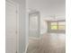 Bright and spacious living room with tile floors and ceiling fan at 15631 W Bethesda Ct, Surprise, AZ 85374