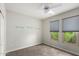 Bedroom with ceiling fan and window coverings at 15631 W Bethesda Ct, Surprise, AZ 85374
