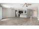 Open concept living area with kitchen and entryway views at 15631 W Bethesda Ct, Surprise, AZ 85374