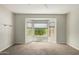 Bright bedroom with bay window and wall-mounted shelves at 15631 W Bethesda Ct, Surprise, AZ 85374