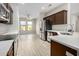 Modern kitchen with stainless steel appliances and ample counter space at 15631 W Bethesda Ct, Surprise, AZ 85374