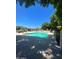 Refreshing community pool with surrounding trees at 3031 N Civic Center Plz # 230, Scottsdale, AZ 85251