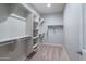 Large walk-in closet with ample shelving and hanging space at 16062 W Alameda Rd, Surprise, AZ 85387