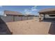 Landscaped backyard with block wall and desert plants at 16062 W Alameda Rd, Surprise, AZ 85387