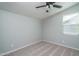 Empty bedroom with ceiling fan and neutral decor at 16062 W Alameda Rd, Surprise, AZ 85387