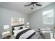 Main bedroom with ceiling fan and modern furniture at 16062 W Alameda Rd, Surprise, AZ 85387