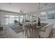 Open concept dining area with sliding glass doors leading to backyard at 16062 W Alameda Rd, Surprise, AZ 85387