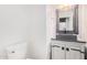 Stylish bathroom with a vessel sink and decorative mirror at 5713 W Rowel Rd, Phoenix, AZ 85083