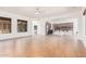 Open kitchen with an island, dark countertops, and ample cabinetry at 5713 W Rowel Rd, Phoenix, AZ 85083